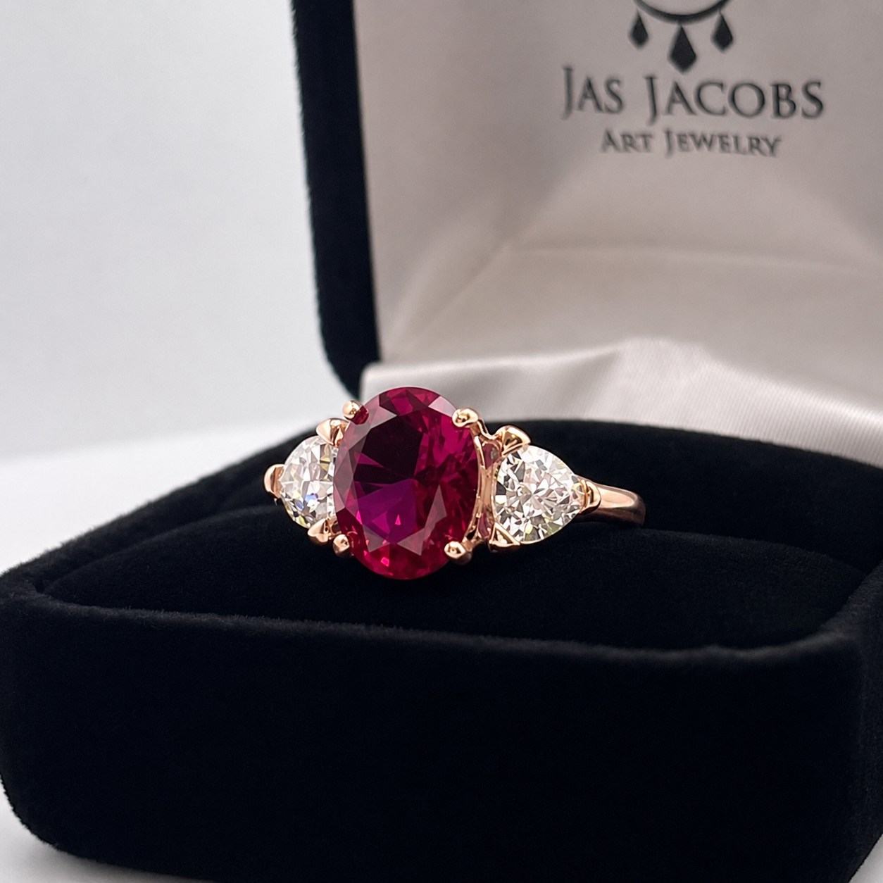 4.5ctw Oval Cut Ruby & Trillion Cut White Sapphire Three Stone Ring