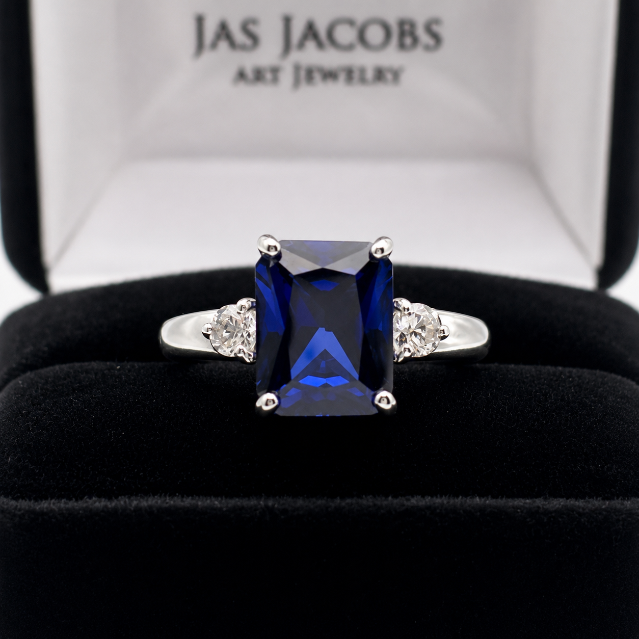 4 Carat Emerald Cut Blue Sapphire Ring with Diamond Accents