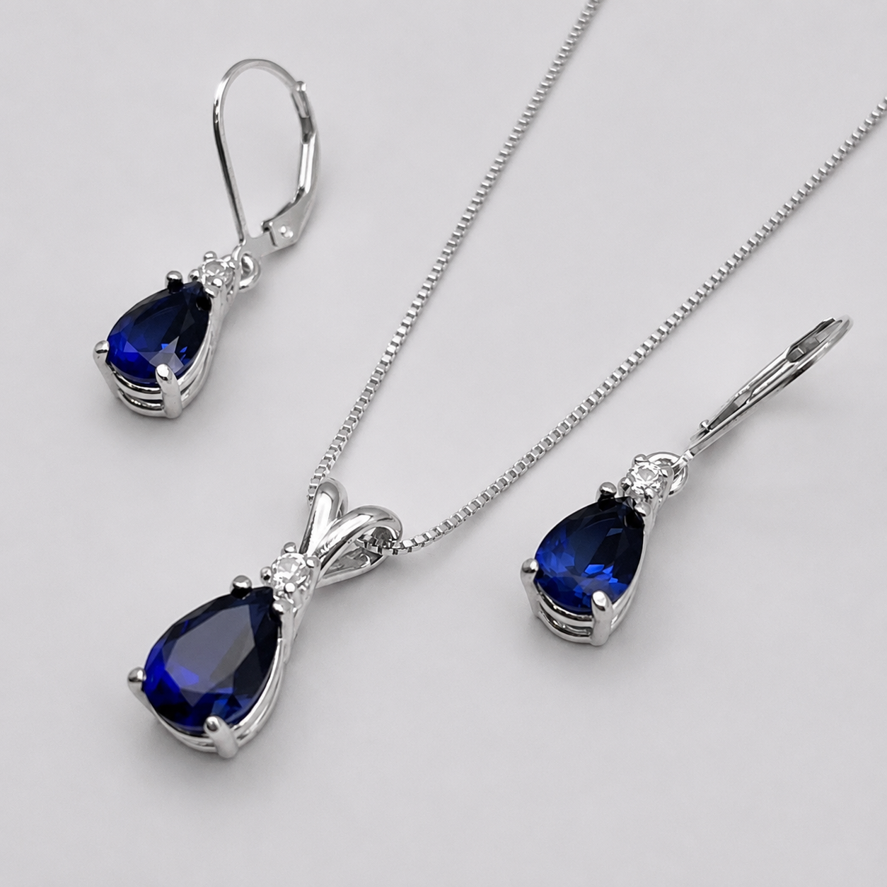 5.5 CTW Pear Cut Blue & White Sapphire Jewelry Set