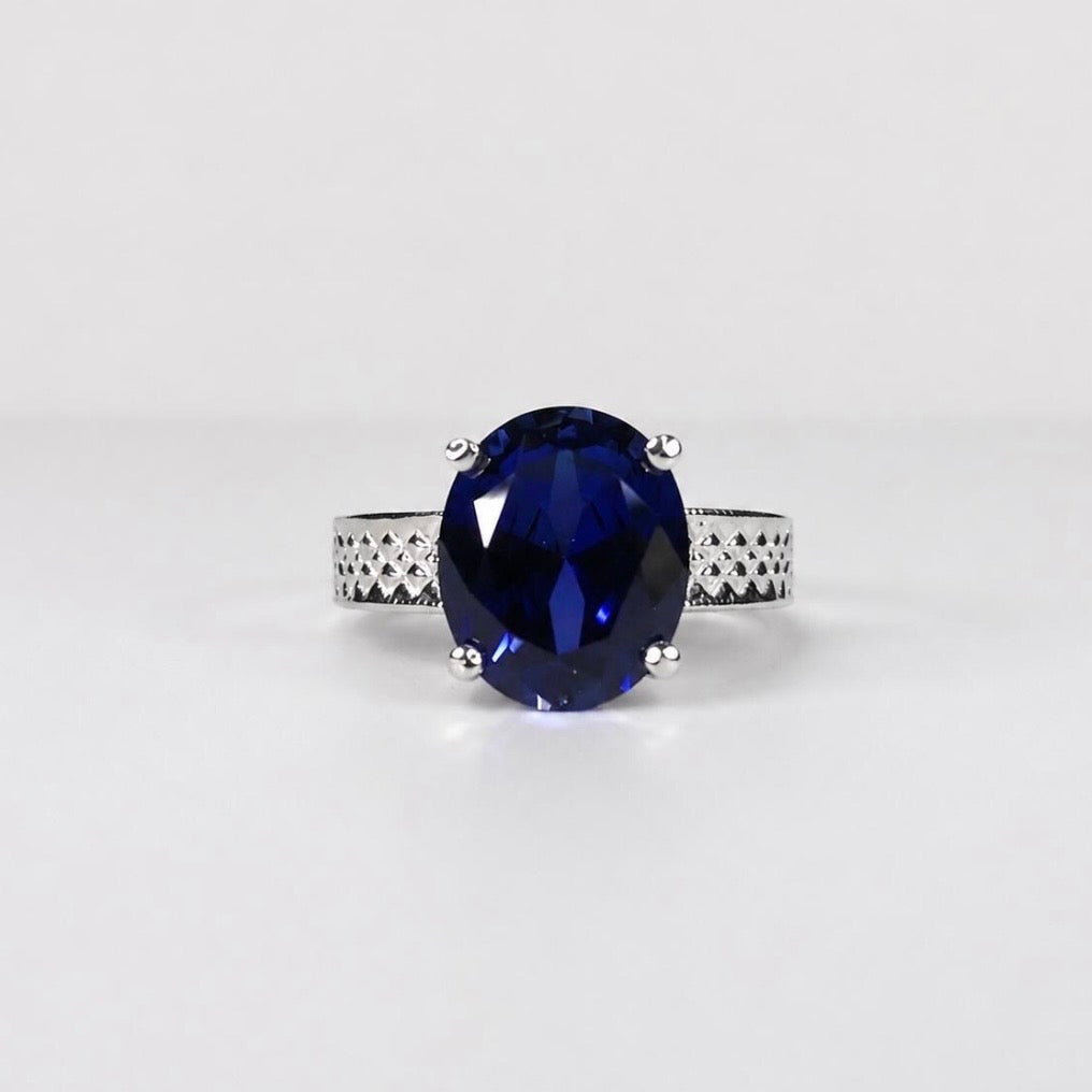 12x10 Blue Sapp Solitaire carved band