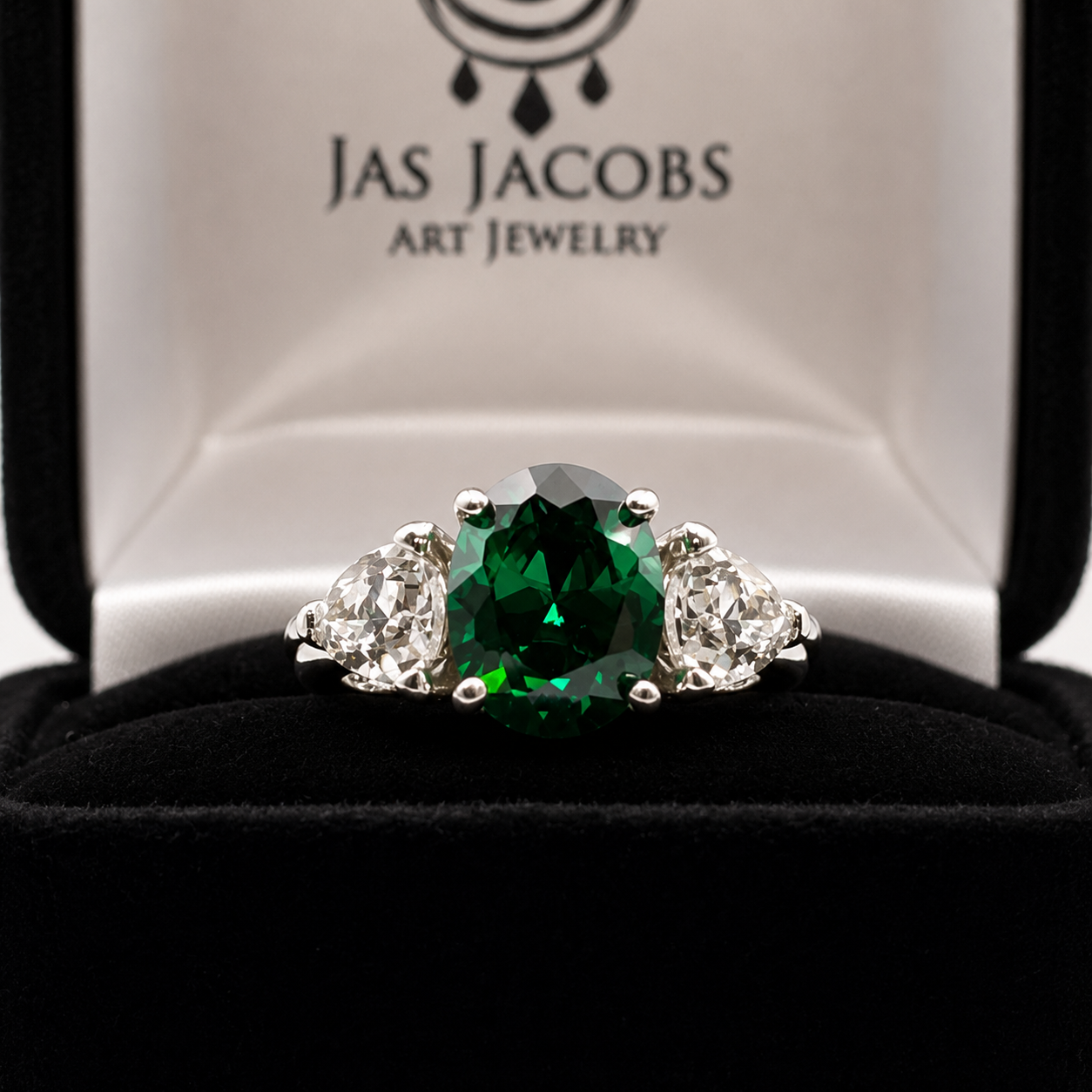 4ctw Oval Cut Lab Grown Emerald & Trillion White Sapphire Three Stone Ring
