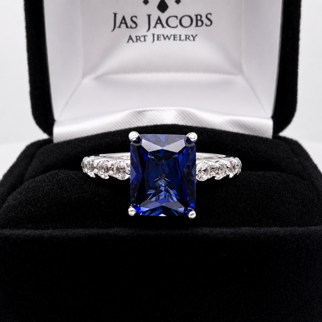 4.64 Carat Emerald Cut Blue Sapphire Ring with Diamond Accents