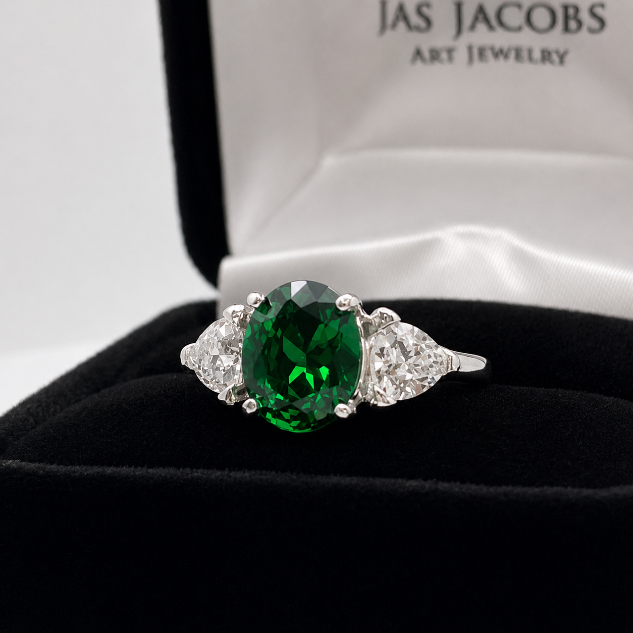4ctw Oval Cut Lab Grown Emerald & Trillion White Sapphire Three Stone Ring