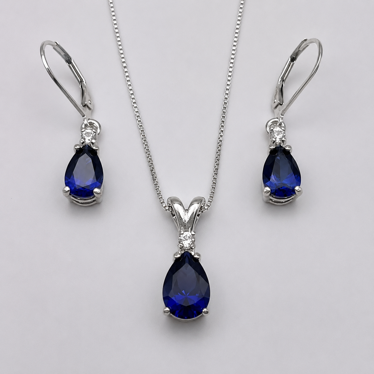5.5 CTW Pear Cut Blue & White Sapphire Jewelry Set