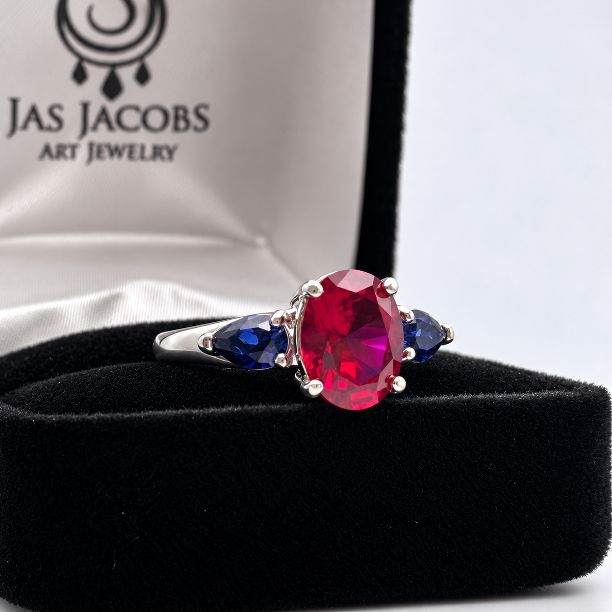 4.5ctw Oval Ruby & Blue Sapphire Three-Stone Statement Ring