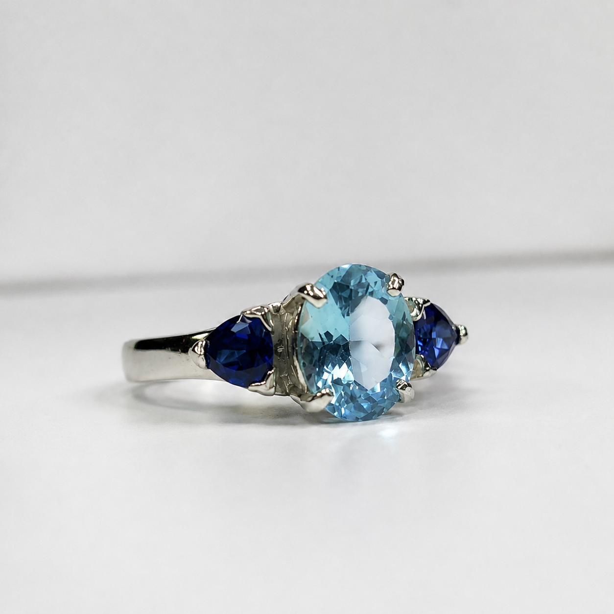 5CTW Oval Cut Sky Blue Topaz Ring | Trillion Blue Sapphire Three Stone Ring