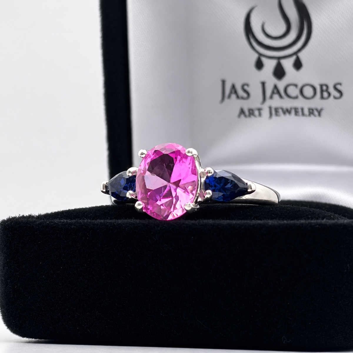4.5ctw Oval Cut Pink & Blue Sapphire Three-Stone Ring