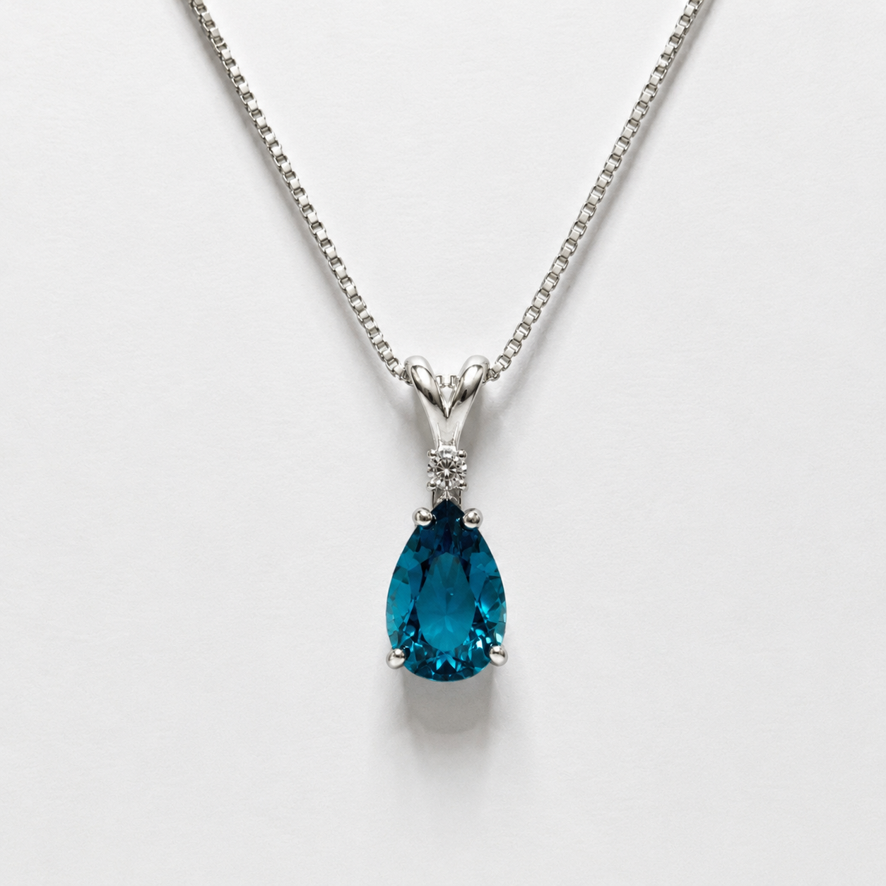 3ct Pear Cut London Blue Spinel Pendant Necklace | White Topaz Accent