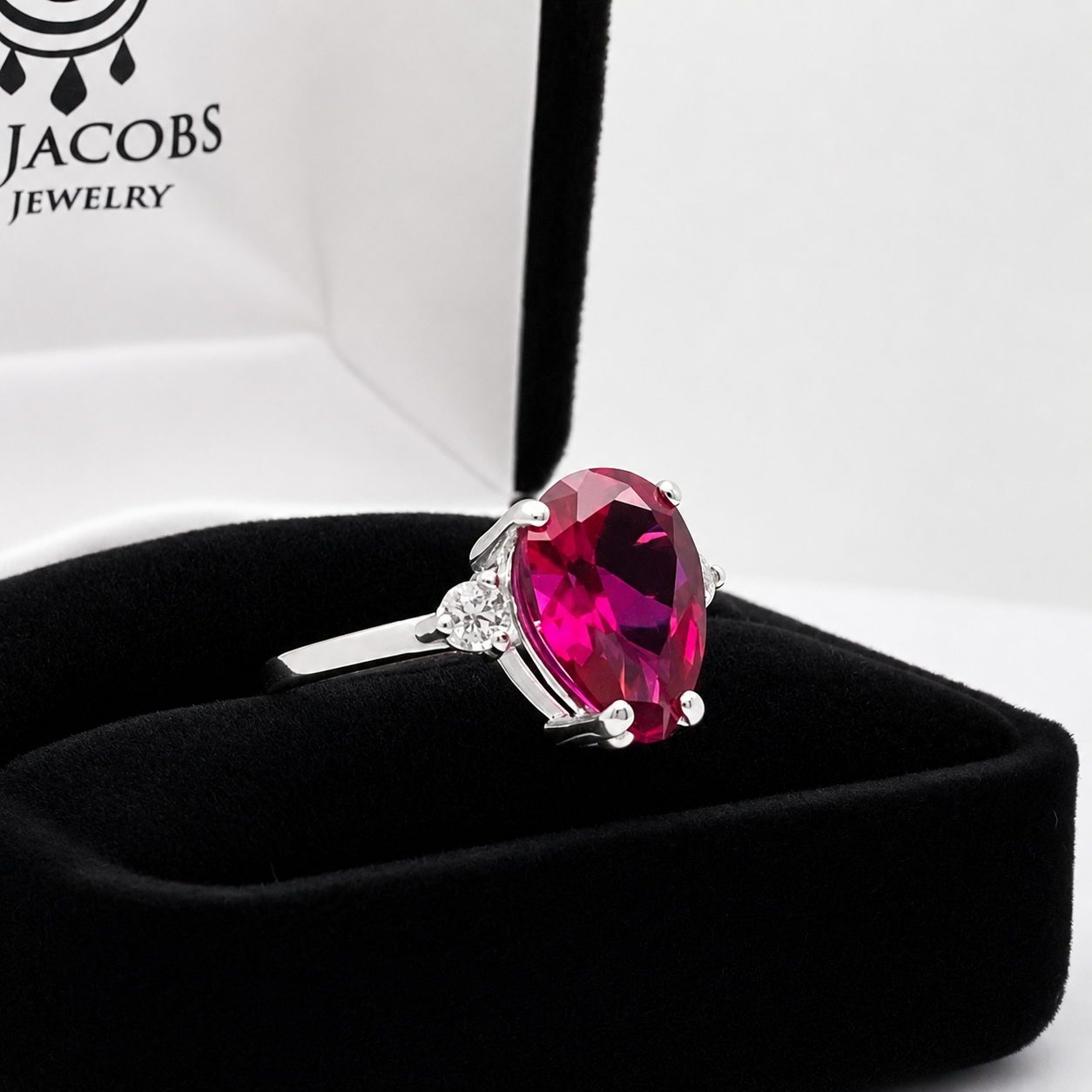 4.7CTW Pear Cut Ruby Ring with White Sapphire Accents