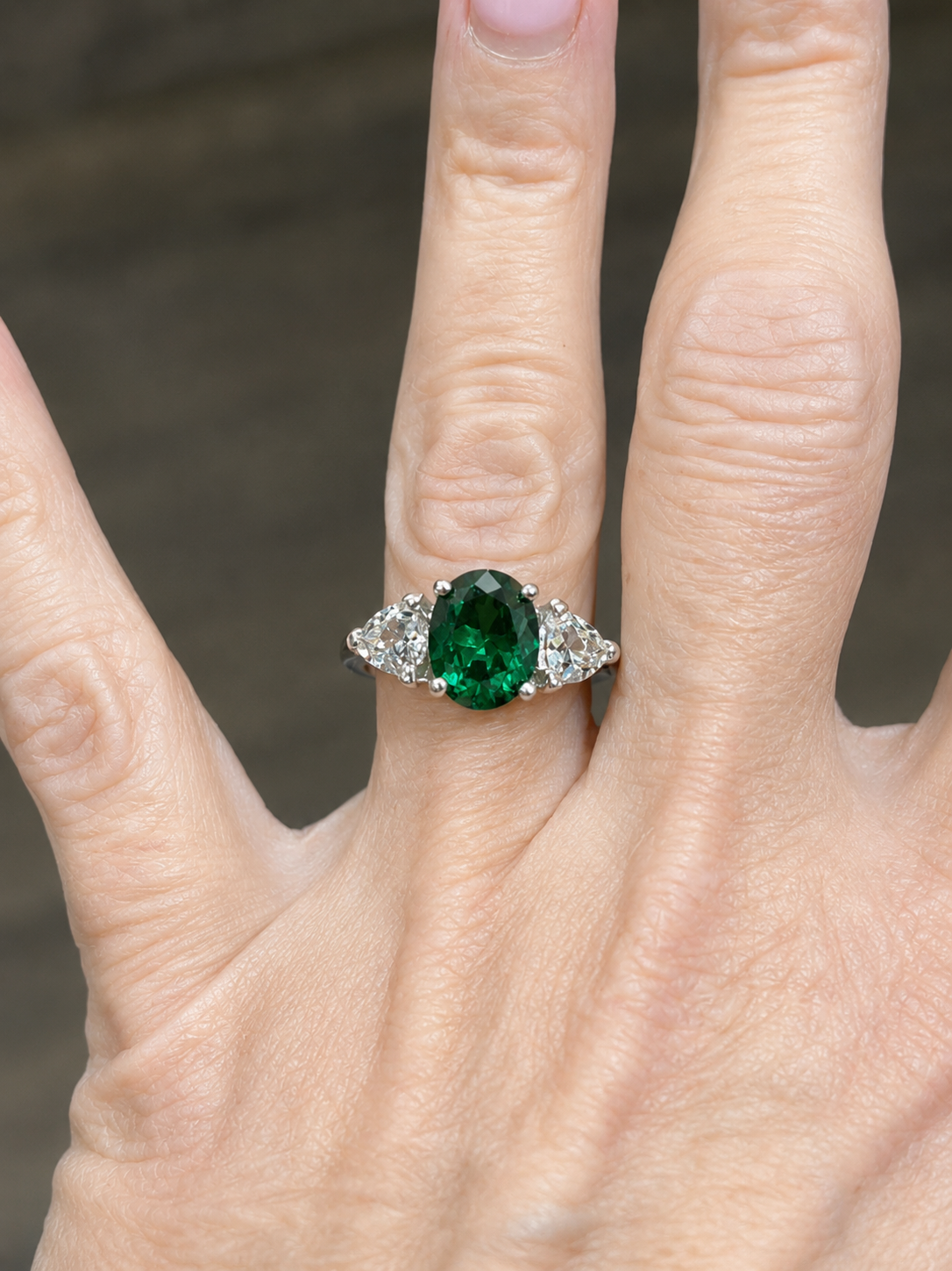 4ctw Oval Cut Lab Grown Emerald & Trillion White Sapphire Three Stone Ring