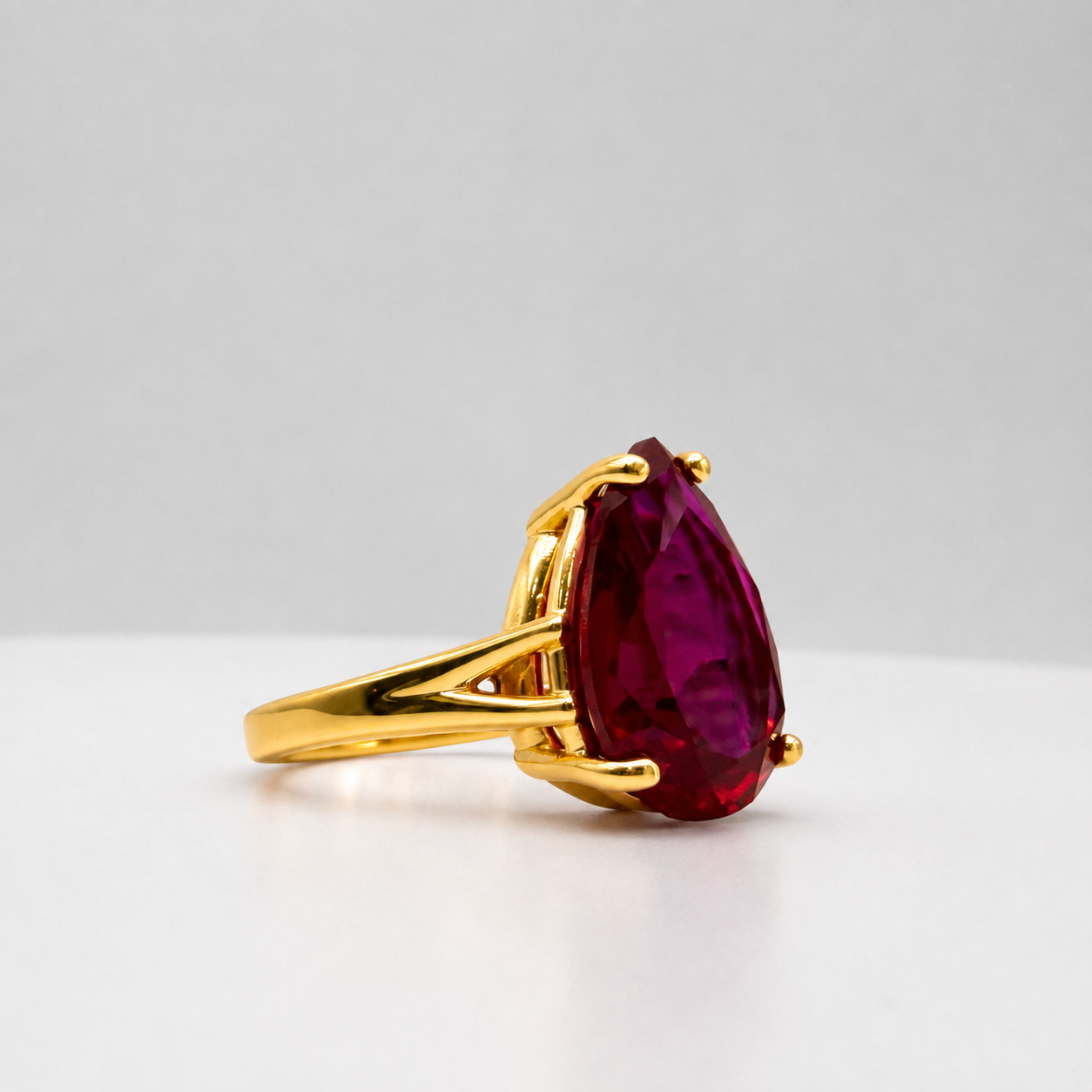 7.5ct Pear Cut Ruby Cathedral Solitaire Ring