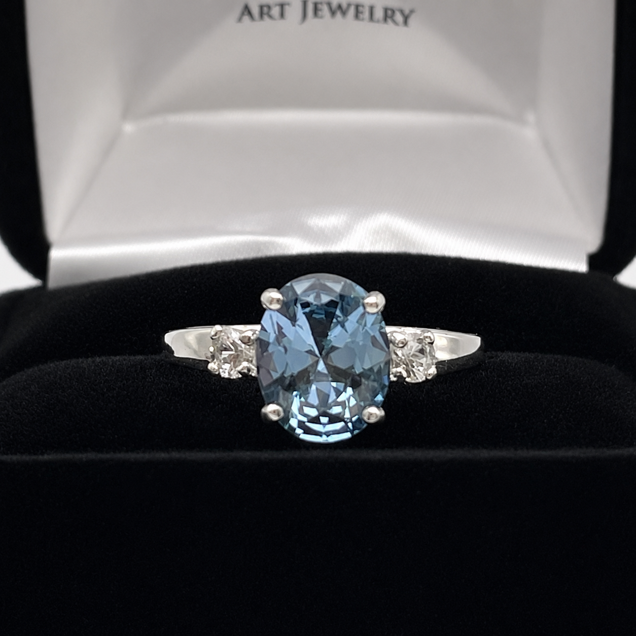 2.6CTW Oval Cut Blue Topaz Ring | White Sapphire Accents