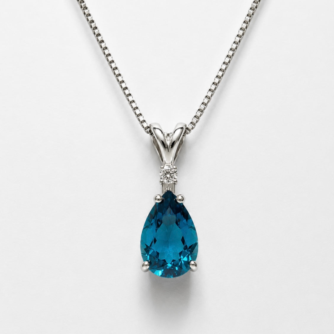 3ct Pear Cut London Blue Spinel Pendant Necklace | White Topaz Accent