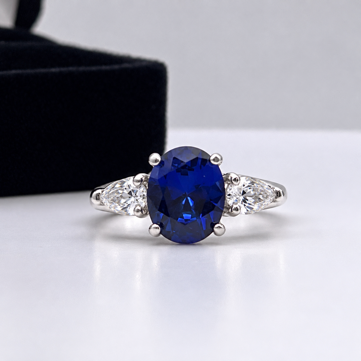 4.5ctw Oval Blue Sapphire & Diamond Three Stone Ring
