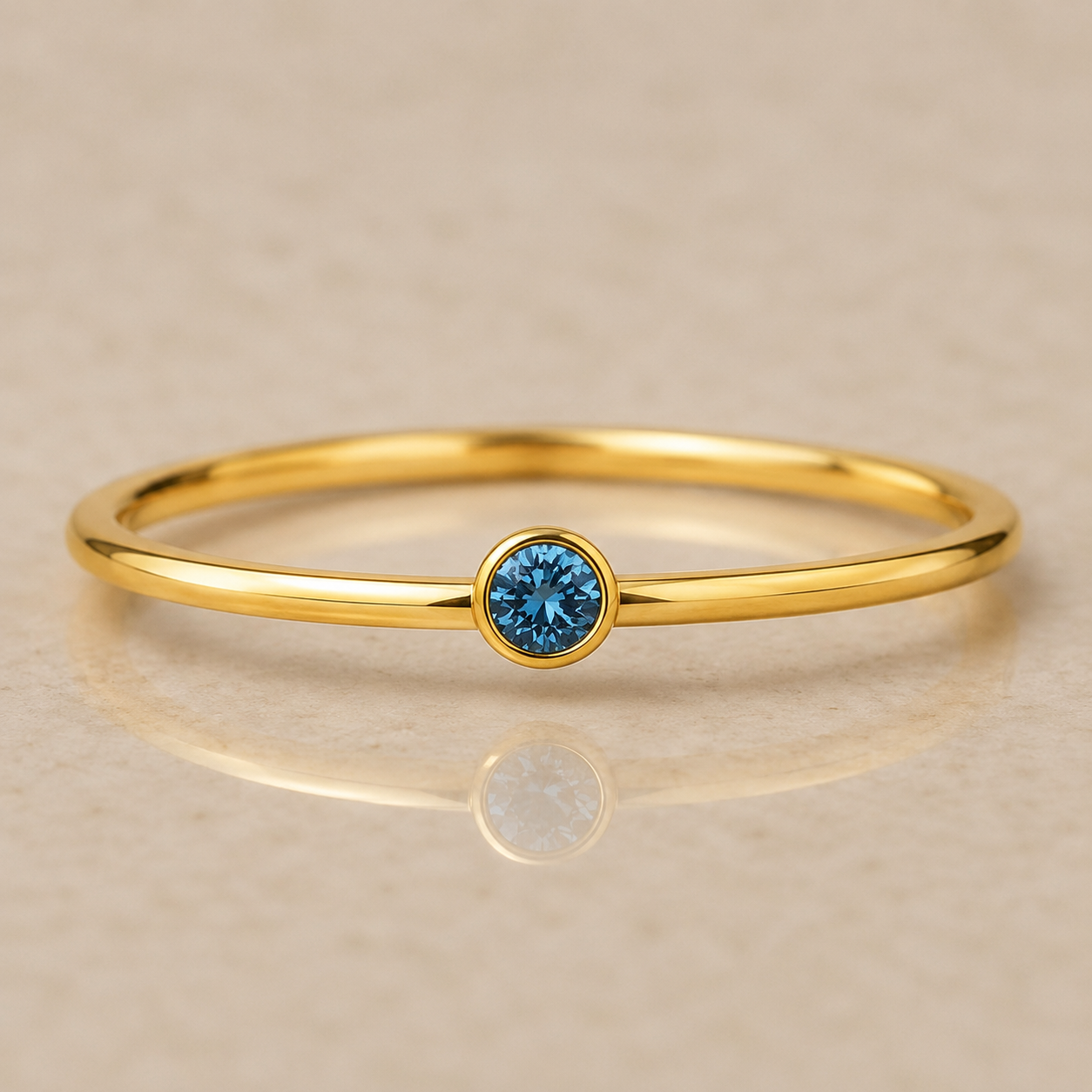14K Yellow Gold Filled 2mm Swiss Blue Topaz Inspired Cubic Zirconia Ring | Water Resistant Bezel Set Stackable Ring