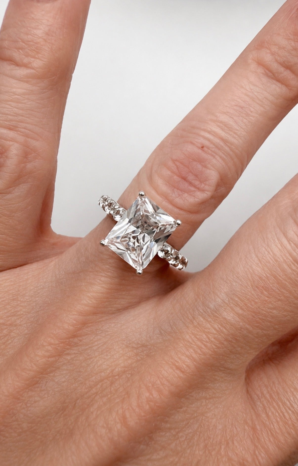 4CT Emerald Cut White Sapphire Ring | 0.64 CTW Diamond Accent Engagement Ring