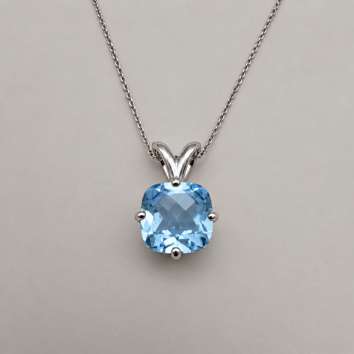2.5ct Checkerboard Cushion Sky Blue Topaz pendant necklace in White Gold