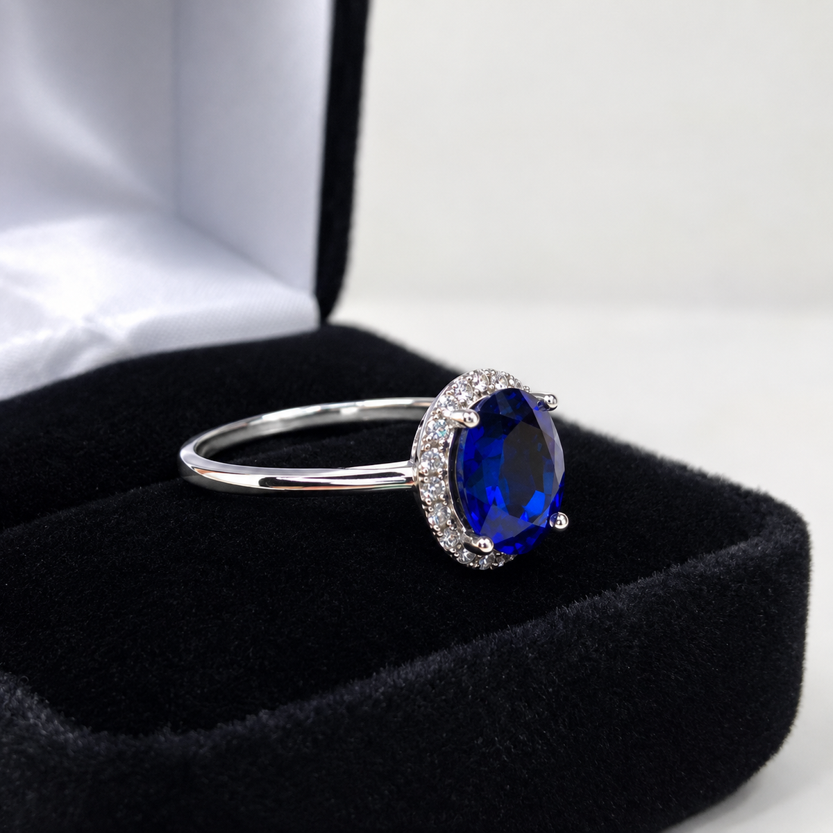 1.5ct Oval Royal Blue Sapphire Halo Ring