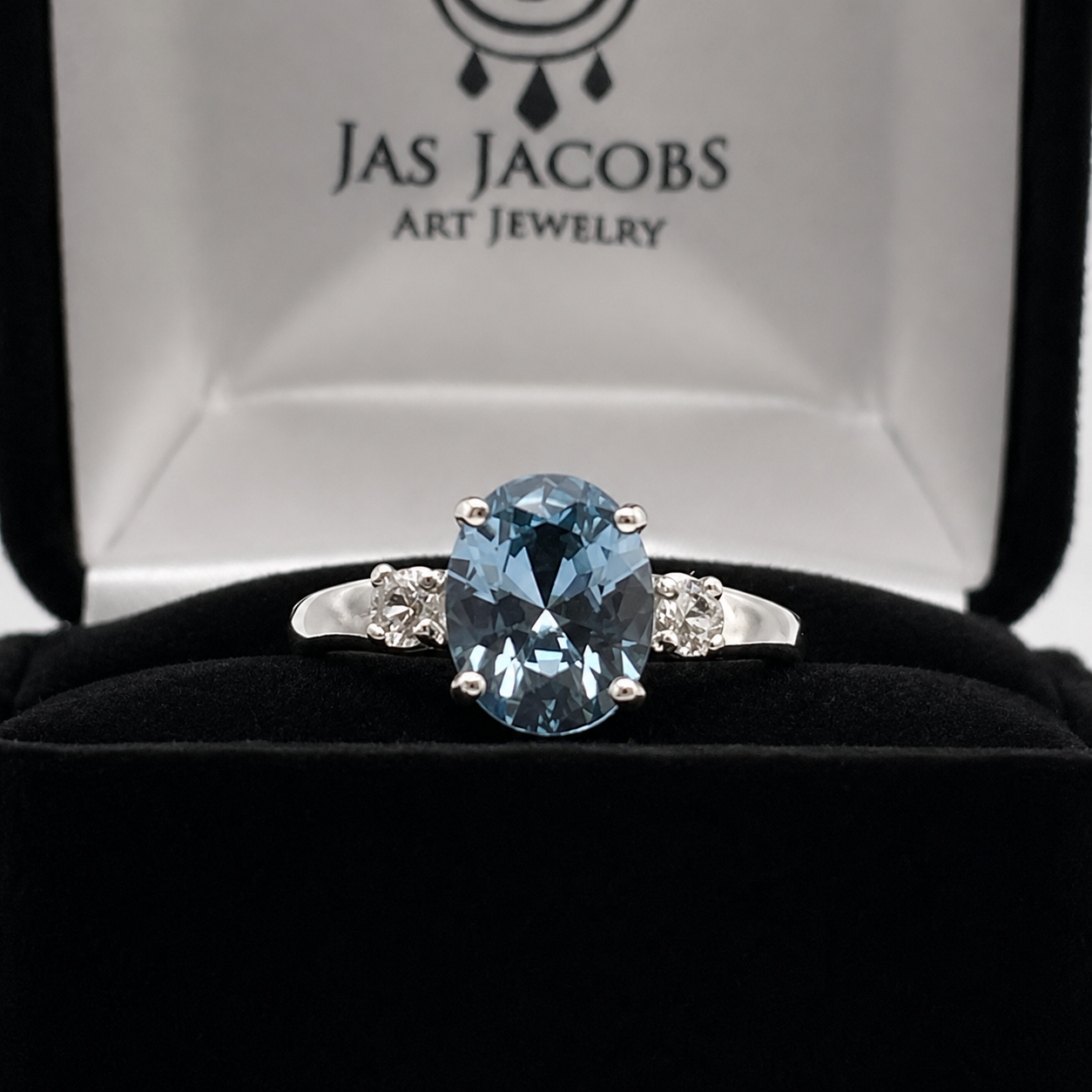 2.6CTW Oval Cut Blue Topaz Ring | White Sapphire Accents