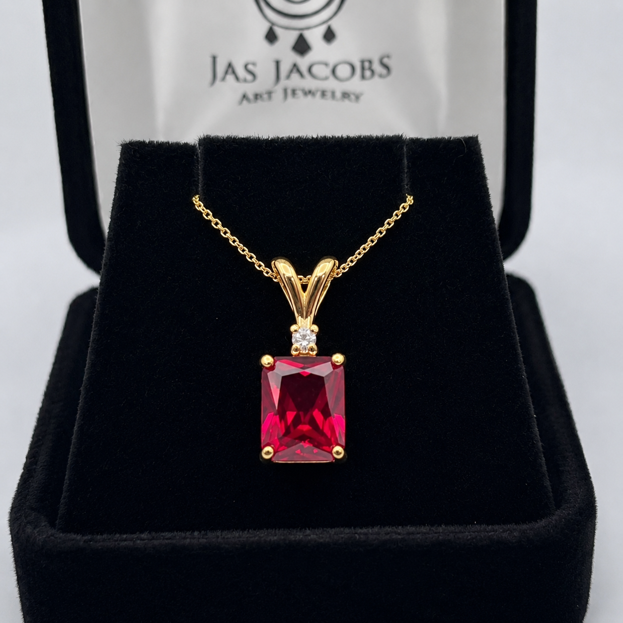 3CTW Emerald Cut Ruby Pendant Necklace | Diamond Accent