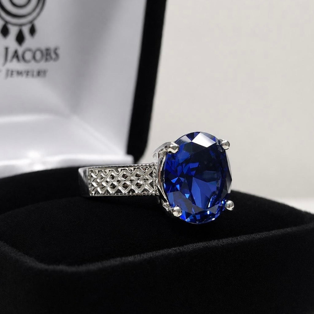 12x10 Blue Sapp Solitaire carved band
