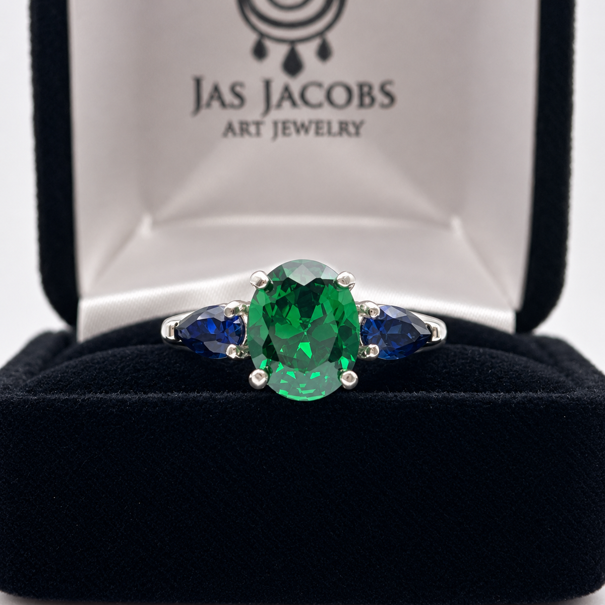 3.6ctw Oval Emerald & Pear Blue Sapphire Three Stone Ring