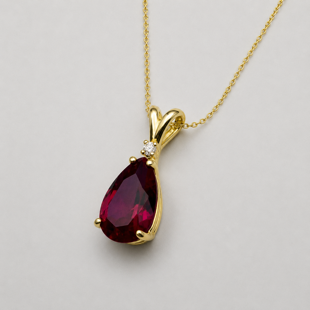 7.5ct Pear Cut Ruby Pendant Necklace with White Sapphire Accent