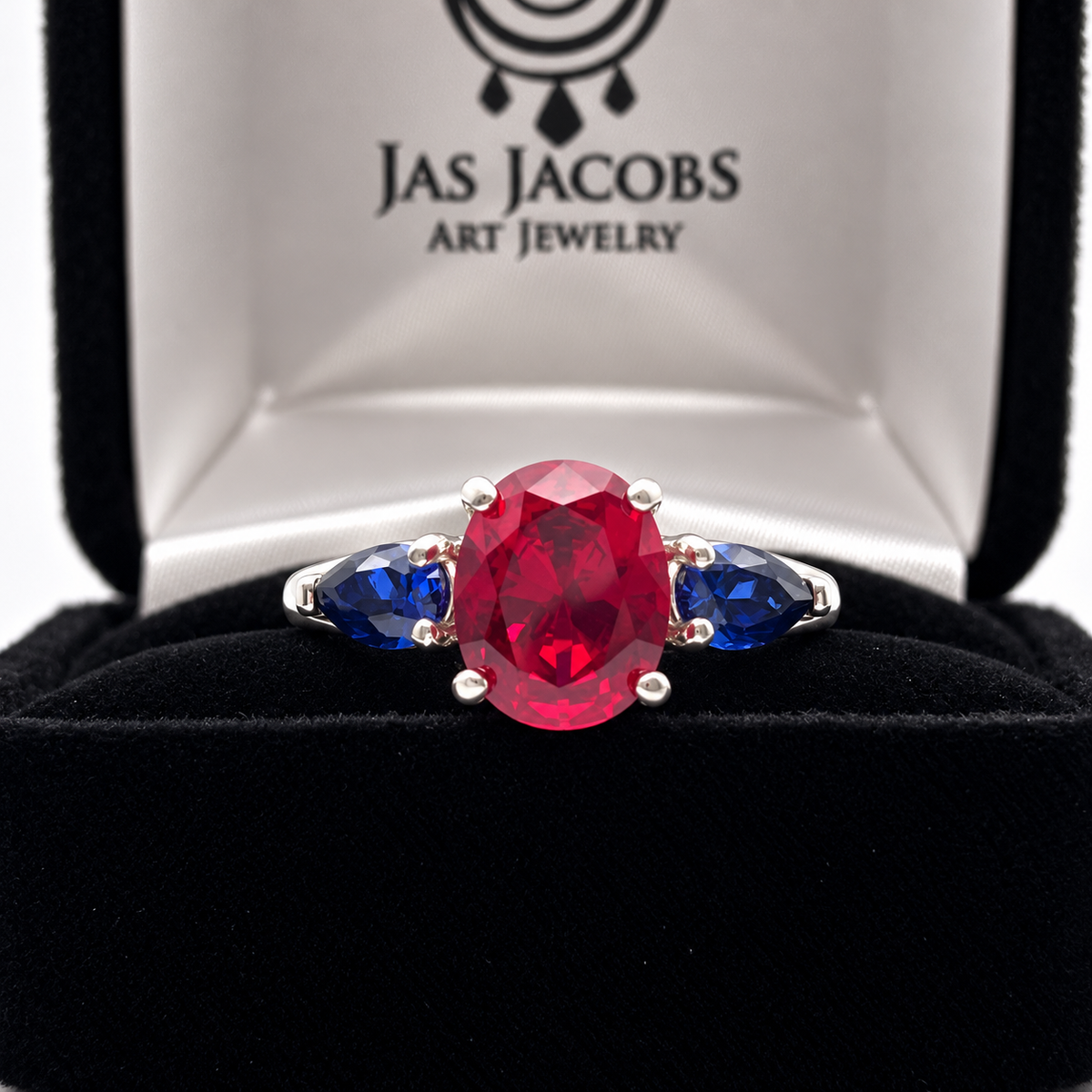 4.5ctw Oval Ruby & Blue Sapphire Three-Stone Statement Ring