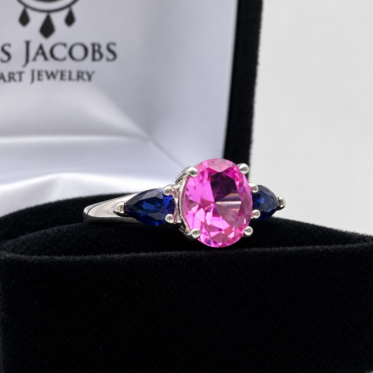 4.5ctw Oval Cut Pink & Blue Sapphire Three-Stone Ring