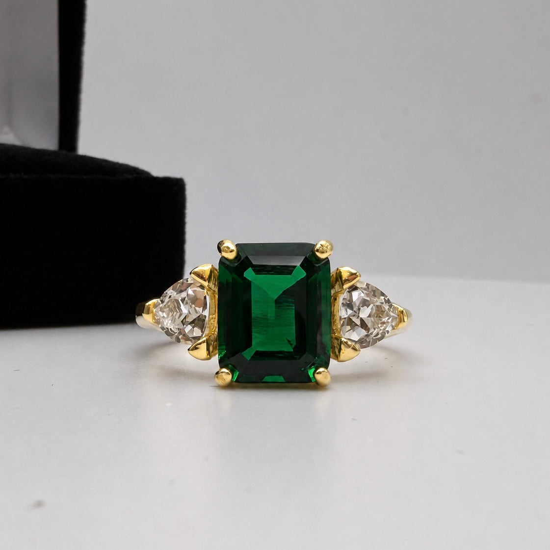 4.5CTW Emerald Cut Lab Emerald Ring | Trillion White Sapphire Three Stone Ring