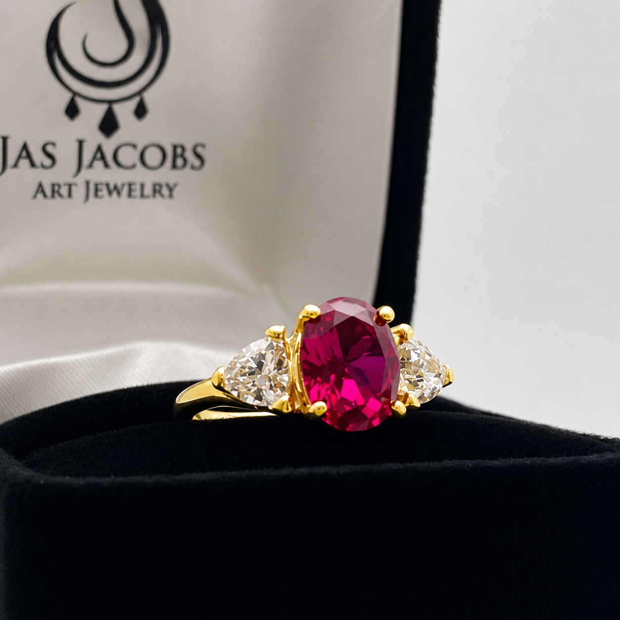 4.5ctw Oval Cut Ruby & Trillion Cut White Sapphire Three Stone Ring