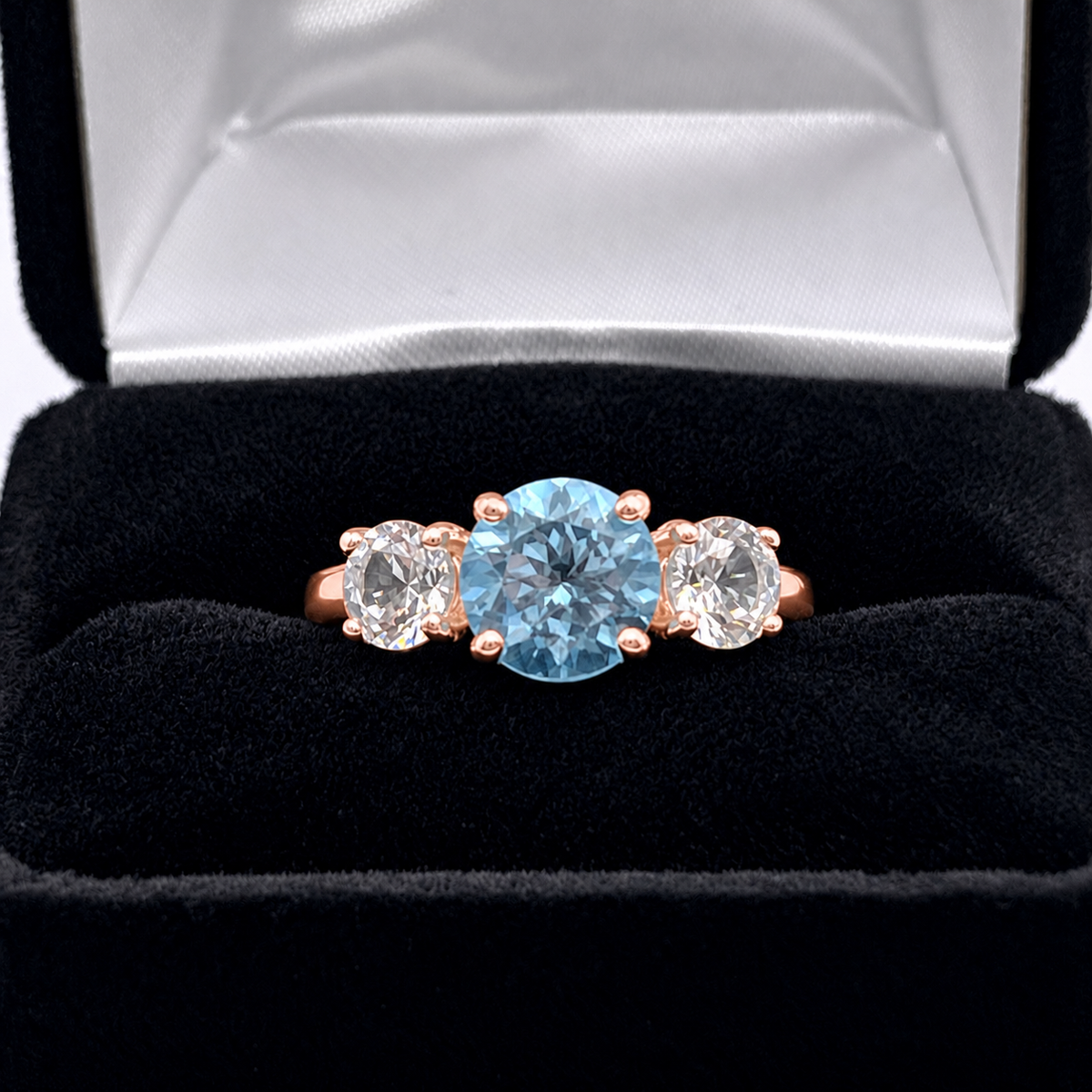 4ct Sky Blue Topaz & White Sapphire Three Stone Ring