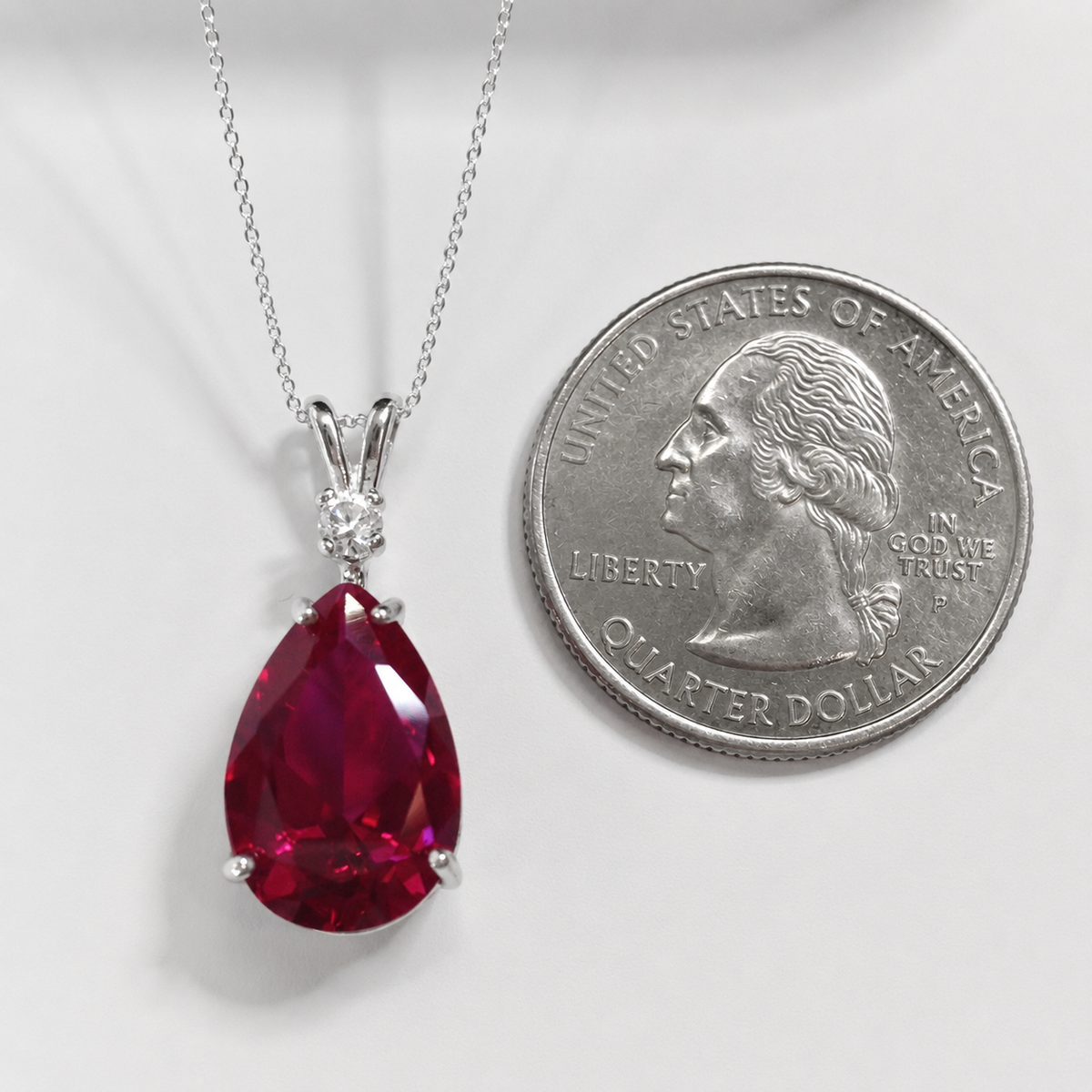 7.5ct Pear Cut Ruby Pendant Necklace with White Sapphire Accent