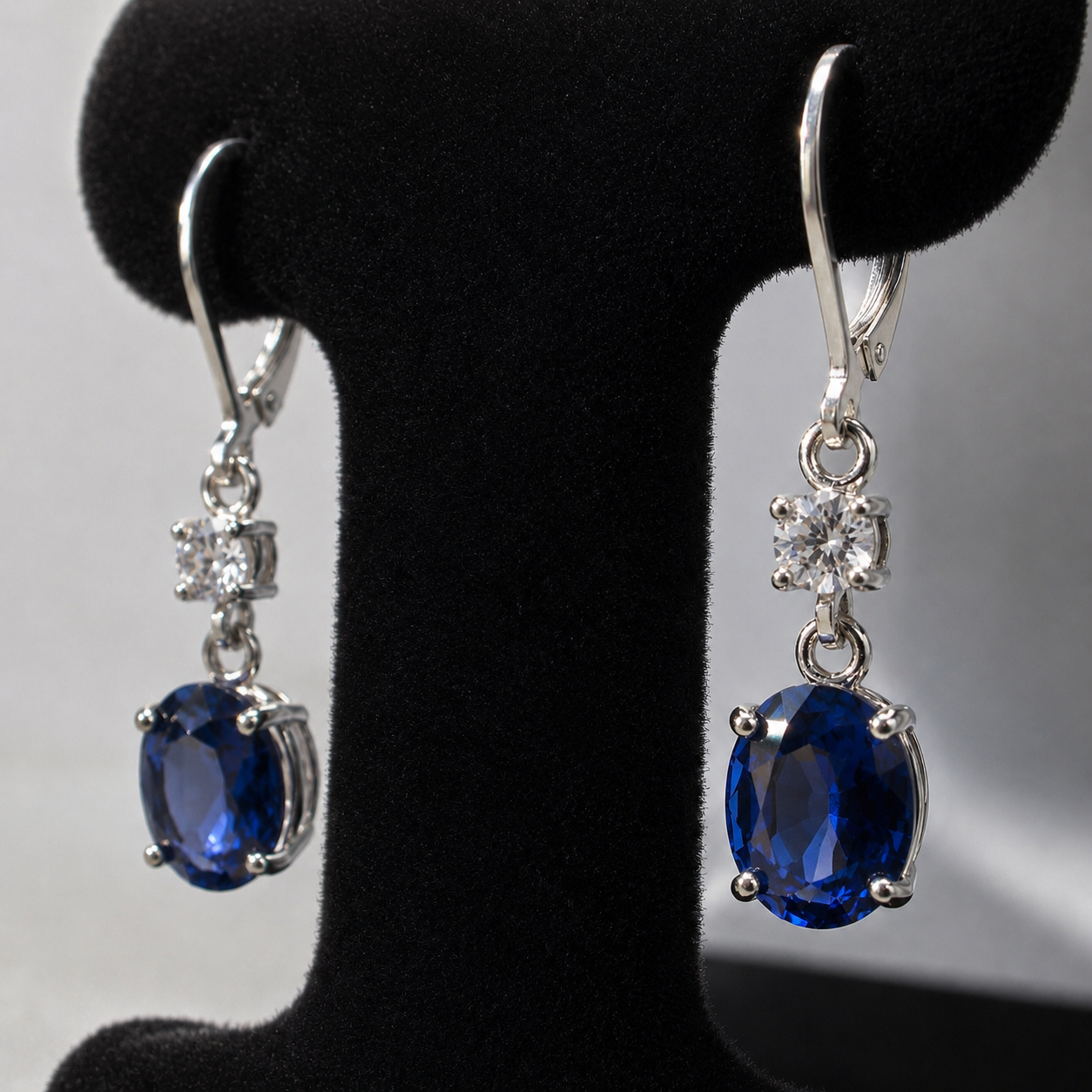 6.4 CTW Oval Cut Blue Sapphire & White Sapphire Earrings