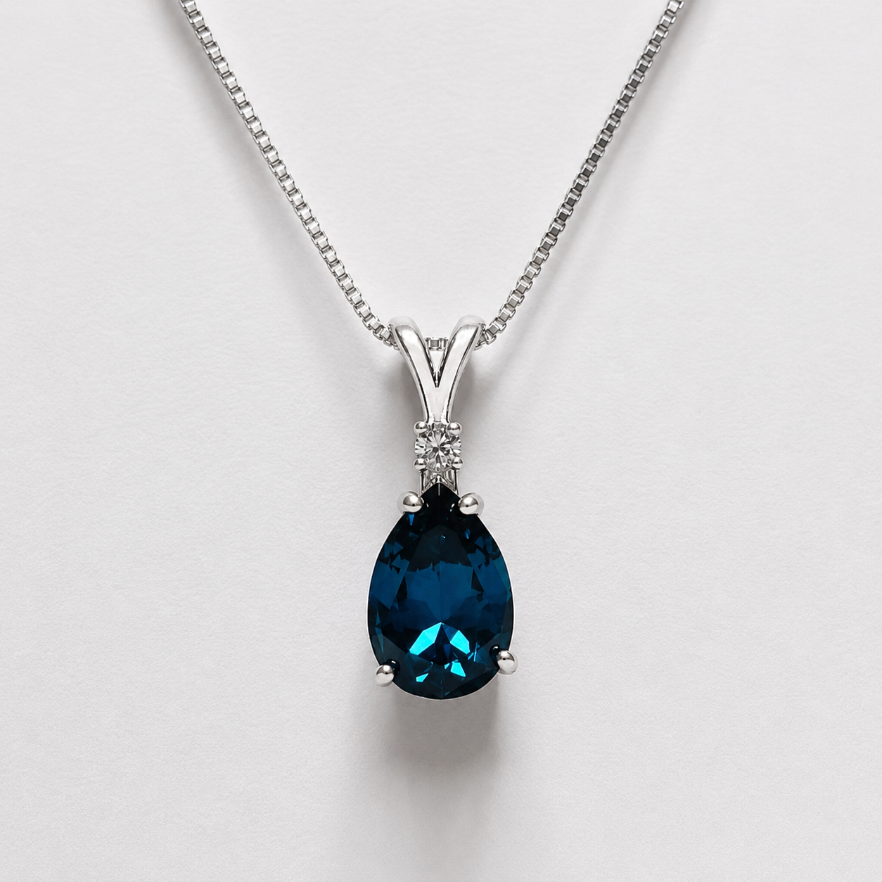 7ctw Pear Cut London Blue Spinel & White Topaz Necklace & Earrings Set