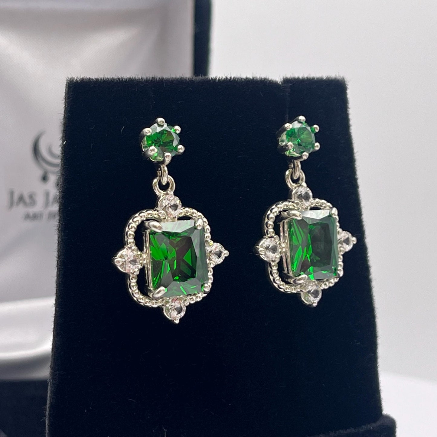 Gorgeous 10.4ctw Emerald Cut Emerald Earrings White Sapphire Accents