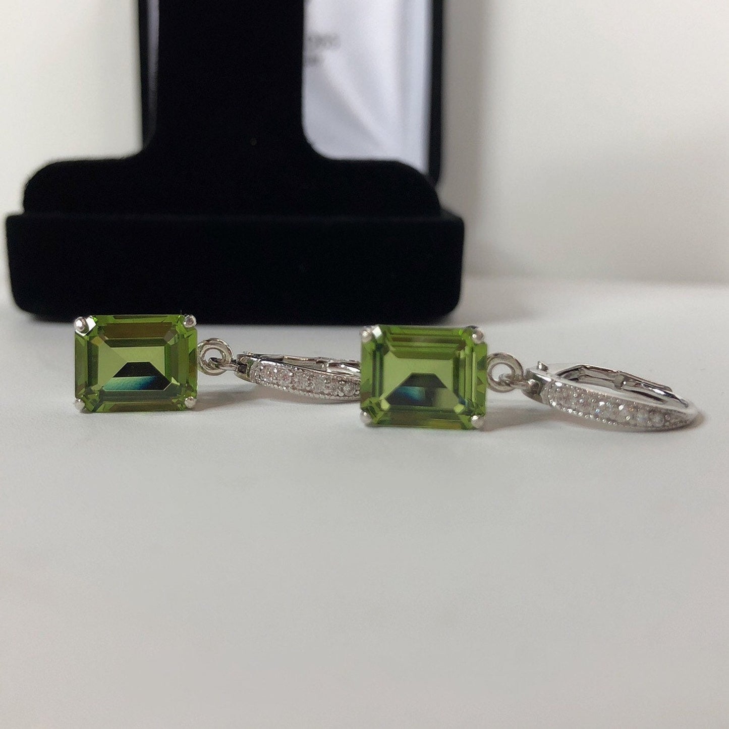 Beautiful 7.3ctw Emerald Cut Peridot Earrings with White Sapphire Accents in Sterling Silver