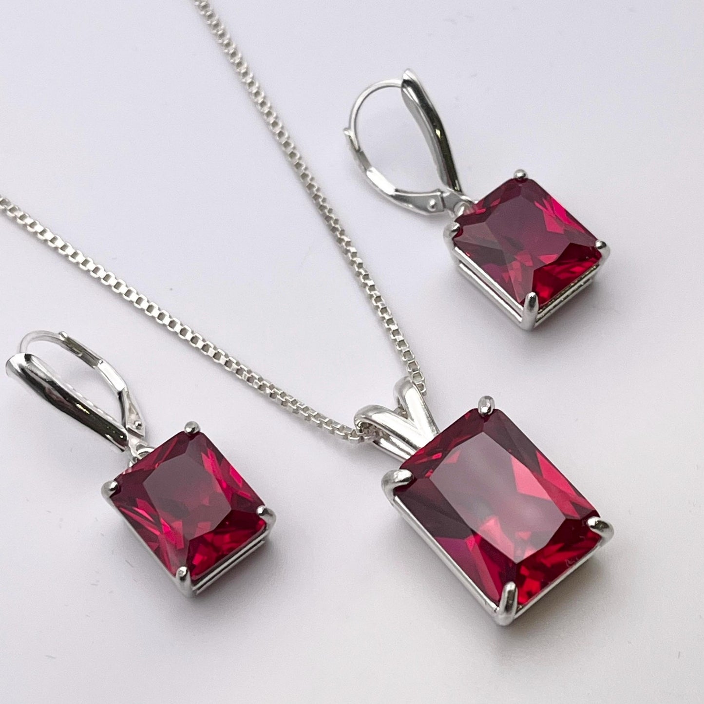 Gorgeous 27ctw Emerald Cut Ruby Necklace & Earrings Set in Sterling Silver